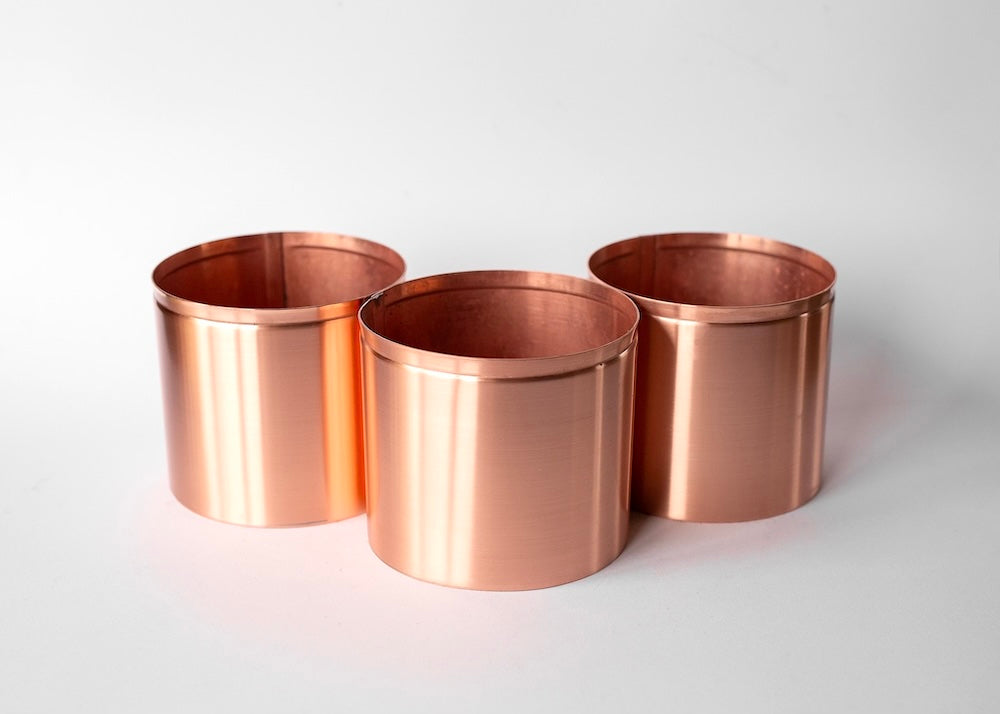 3 9cm copper pots in triangle