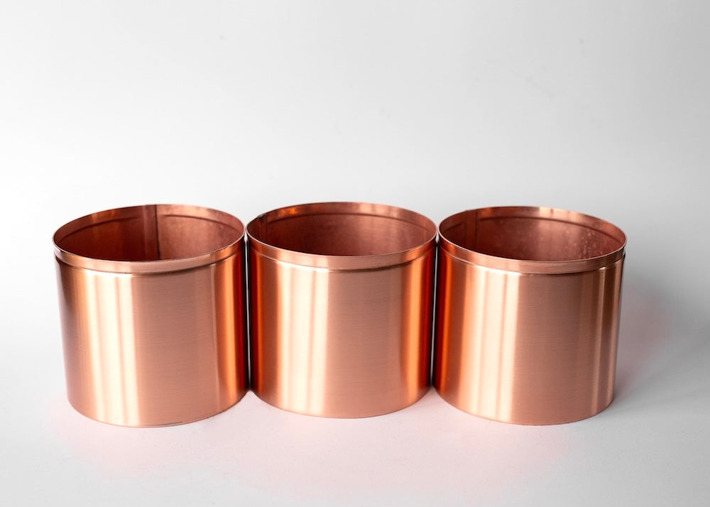 3 9cm copper pots in line